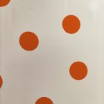 white orange dot fabric
