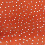 68 orange white dot fabric