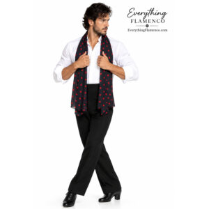 Black flamenco scarf with red polka dots worn by a male model